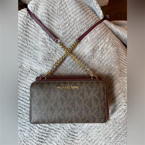 michael kors tina clutch|michael kors clutch crossbody.